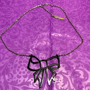 NOS Vintage Cut Out Bow Tie Black Enamel Pendant Necklace by GirlProps